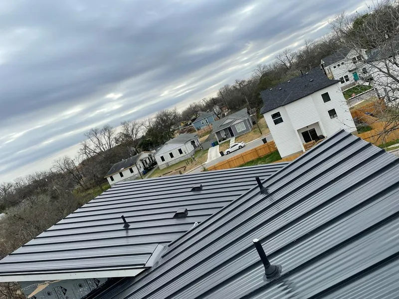 Standing seam metal roof panels with vents for Skylight Repair in Enoch